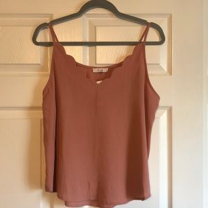 Scalloped tank